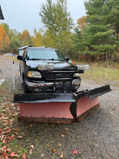 2001 Ford F-150 plow truck with 8’ 2