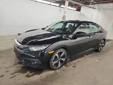 2017 Honda Civic 4dr CVT Touring Image# 1