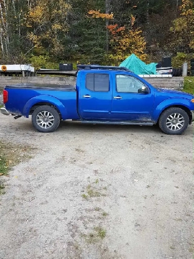 2013 Nissan Frontier 4x4 crew cab SAFETIED Image# 1