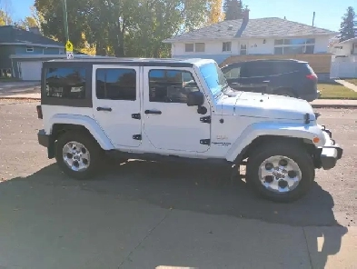 2013 Jeep 4dr Sahara unlimited. Image# 1