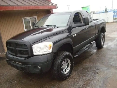 2007 Dodge Ram 3500 4X4 QUAD CAB 5.9L DIESEL LARAMIE Image# 1