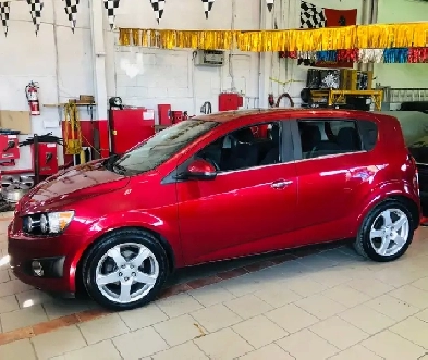 2012 CHEVROLET SONIC LT/ BAS KM’S/ TOIT FULL/ UN VRAIS BIJOU ! Image# 1