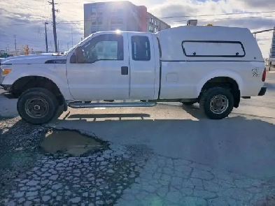 2015 Ford Super Duty F-250 SRW 4x4.4 doors, extended cab 6 pass, Image# 1