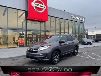 2021 Honda Pilot Touring AWD • 8 Pass • Rear Entertainment Image# 1