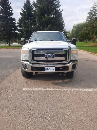 2011 Ford  F350  crew cab 4x4 super duty 8 ft. Box ,  gooseneck Image# 1