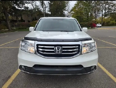 2015 Honda Pilot Touring 4WD 8-Passenger (Fully Honda Certified) Image# 1