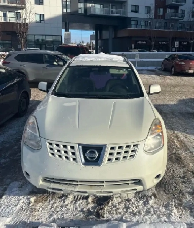 2009 Nissan Rogue with full set of winter tires Image# 1