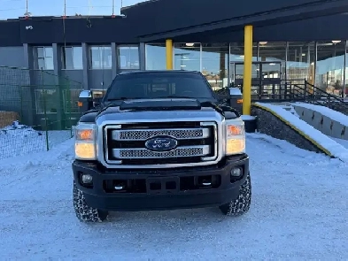 2013 F350 platinum diesel four-wheel-drive 6 inch lift immaculat Image# 1