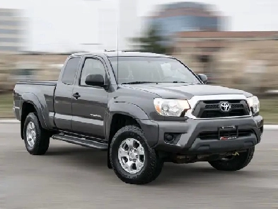 2014 Toyota Tacoma MANUAL TRANSMISSION|4WD|QUAD CAB|CLEAN CARFAX Image# 1