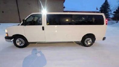 2014 Chevy Express 15 passenger Image# 1