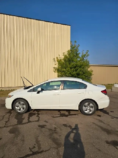 Honda Civic LX 2013 for sale with 2 sets of tires on rims Image# 1