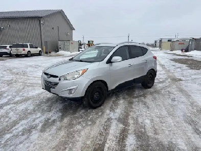 2011 HYUNDAI TUCSON AWD SAFETIED Image# 1