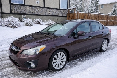 2012 Subaru Impreza 2.0 liter AWD looks like Civic Corolla Jetta Image# 1