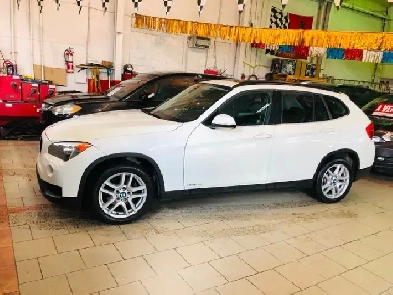 2014 BMW x1 AWD 28i ECO 98000 KM TOIT PANO COMME NEUVE UN V