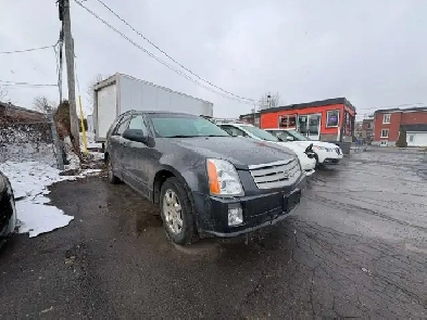 Cadillac SRX 2008 aut. Cruir. toit. $4495. rusty 450-820-0550