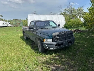 Rusty but Trusty 1996 Ram Conquer with 8ft Box.
