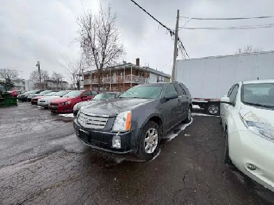 Cadillac SRX 2008 aut. Cruir. toit.AWD $4495. rusty 450-820-0550