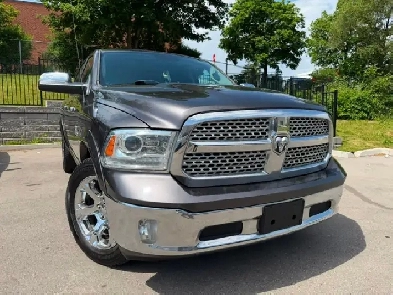 2015 Ram 1500 4WD Crew Cab 140.5' Laramie