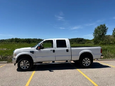 2008 Ford F350. WITH TRAILER. V10 Gas. 6.8 L, Super Duty Lariat.