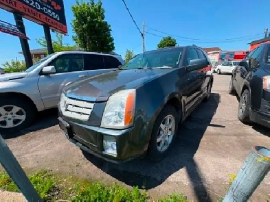 Cadillac SRX 2008 aut. Cruir. toit.AWD $4495. rusty 450-820-0550