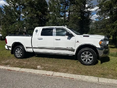 LIMITED DODGE RAM WITH NEW WARANTEED 6.7L CUMMINS DIESEL ENGINE
