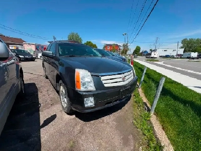 Cadillac SRX 2008 aut. Cruir. toit.AWD $4495. rusty 450-820-0550