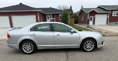 2010 FORD FUSION SEL PKG..... FWD PKG