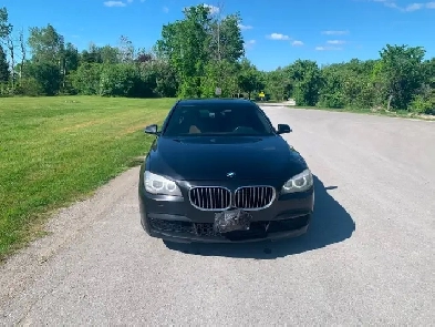 2013 BMW 750 I X DRIVE safety and certified and warranty