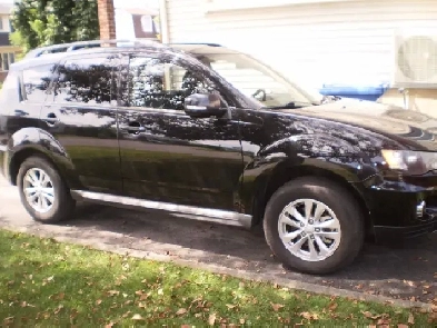 mitsubishi outlander 2011  super condition  $6900 négo..!!
