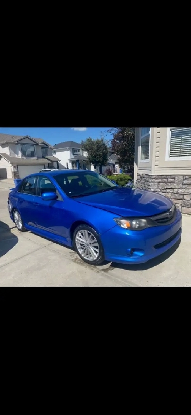 2011 Subaru Impreza ((Super Clean))