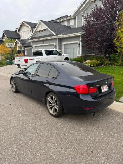 2015 BMW 320i xDrive Sport Line — $7,999