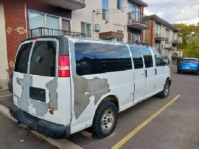 2009 White GMC Savana Van -Whyte Ave Area