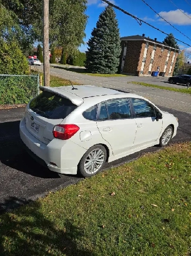 Subaru Impreza Sport Touring 2015 $5900.